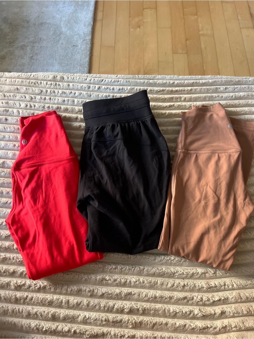 Set of 3 Lululemon leggings, Size 2. Red, black jogger style, and dusty rose